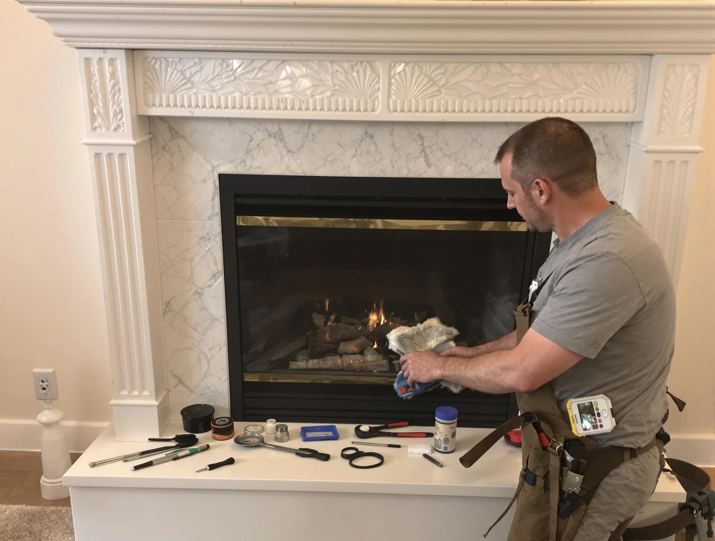 Beaver Falls Chimney Sweep performing fireplace maintenance in Beaver Falls, PA