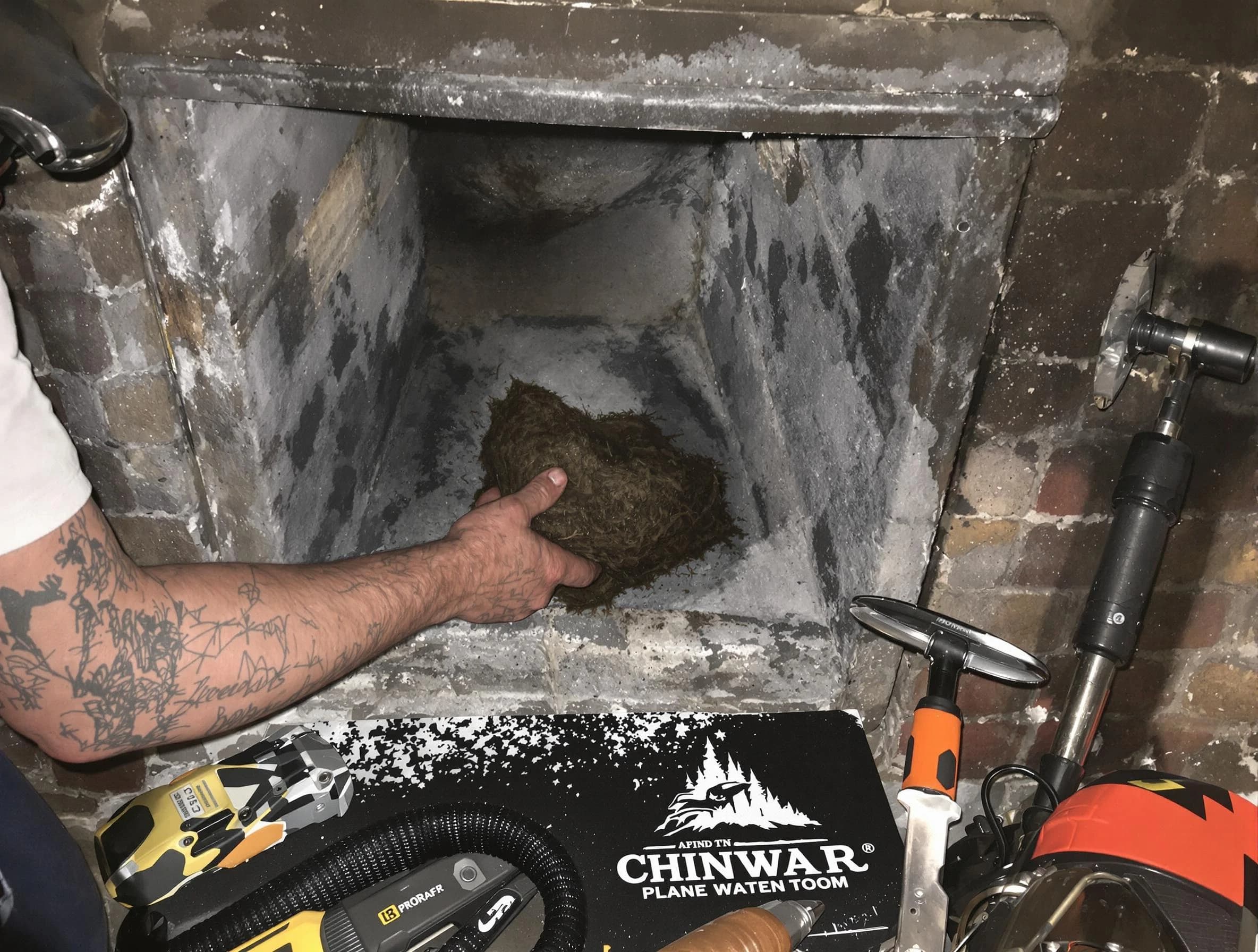 Beaver Falls Chimney Sweep safely removing debris and screening chimney in Beaver Falls, PA